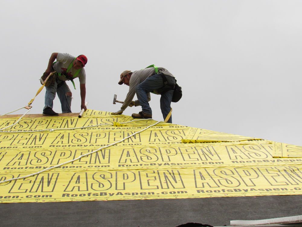 Roofers putting on Aspen Underlayment