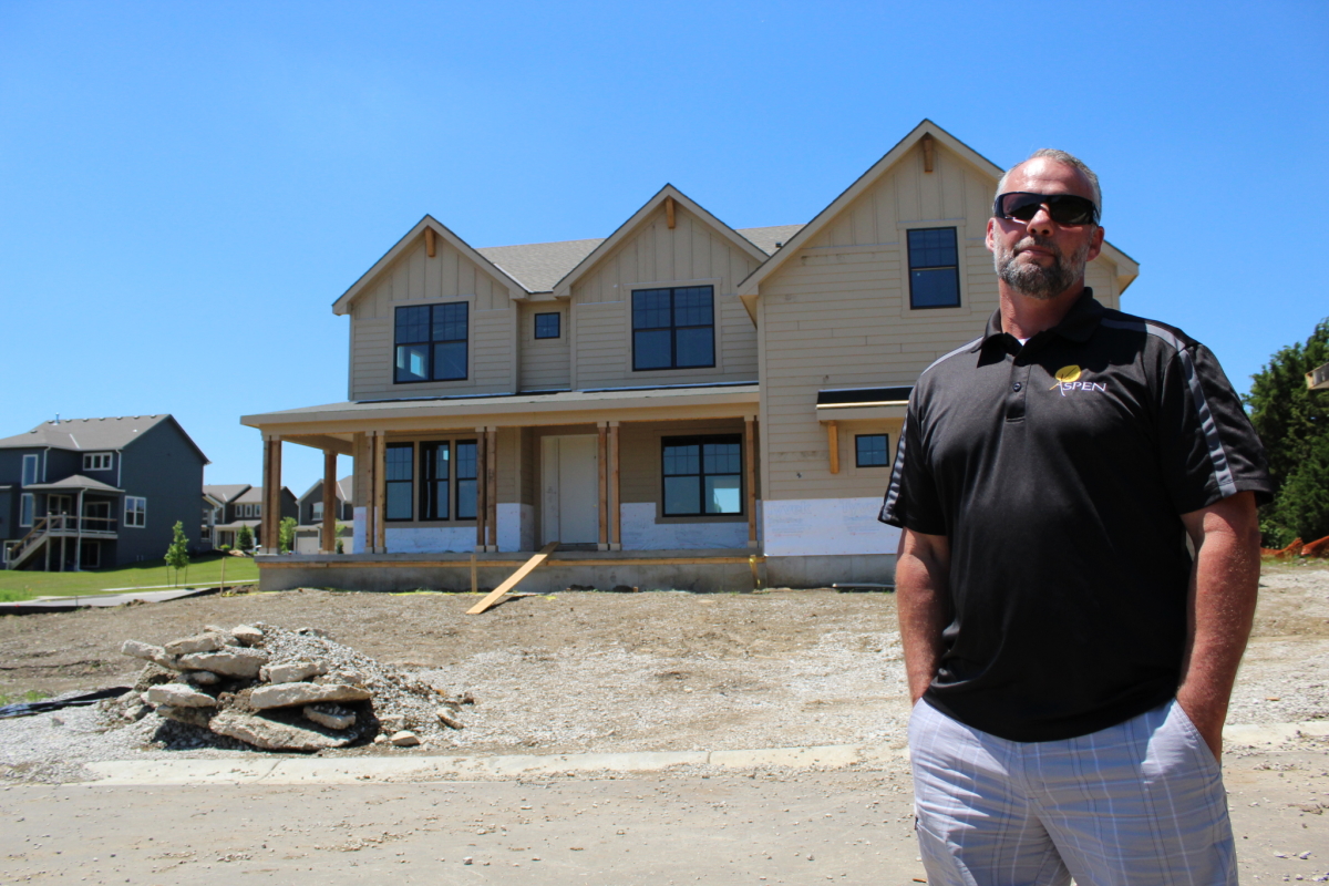 Michael Toole helps with kansas city residential roofs build for summit custom home account