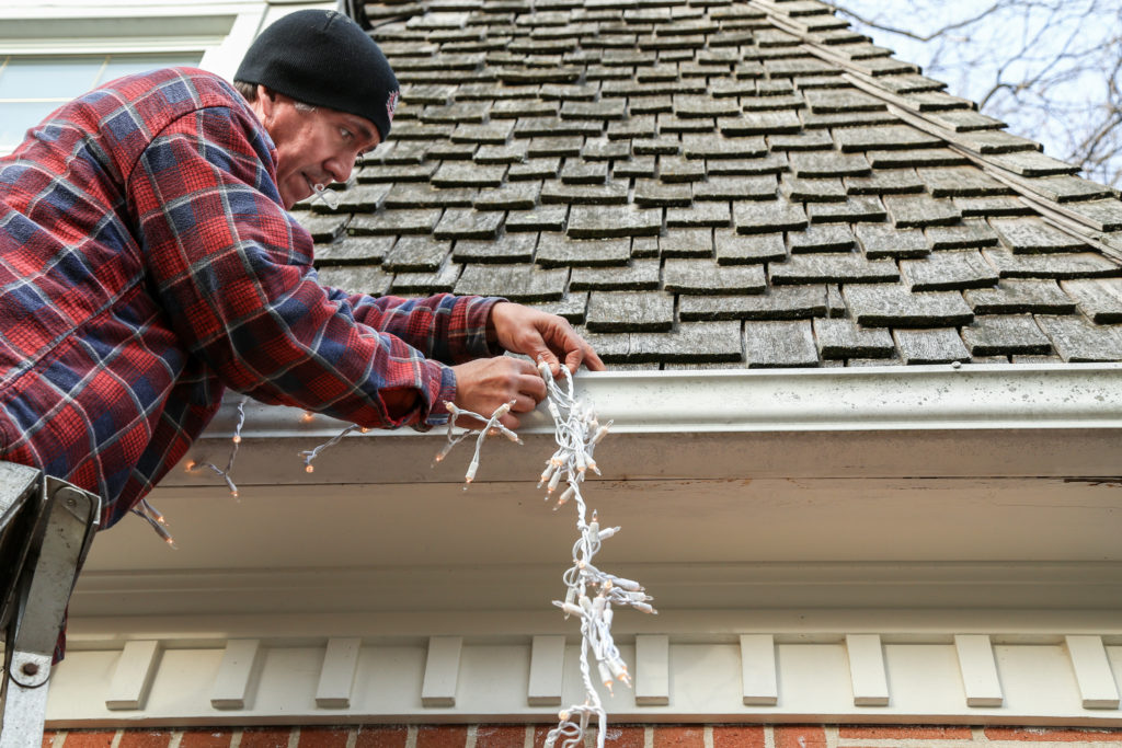 How to hang holiday lights on your roof